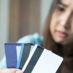 Young Female with Multiple Credit Cards