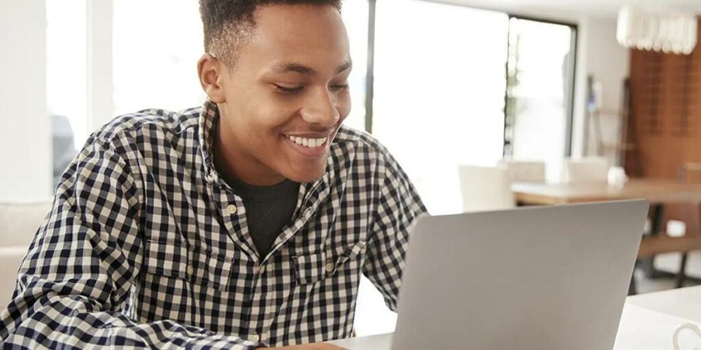 Young Man on a computer working