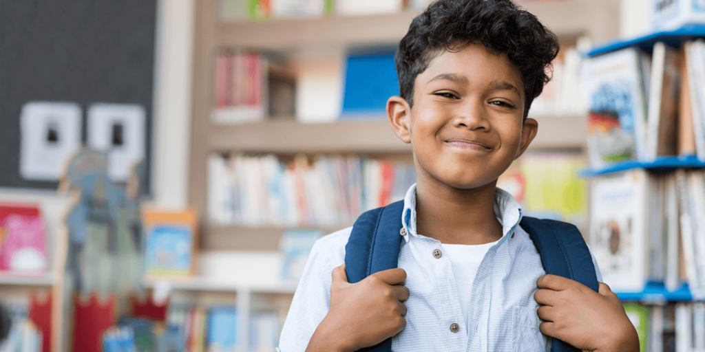 student in library