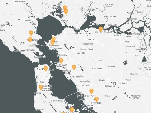 A black and white map of the bay area showing where SparkPoint Centers are located with orange arrows.