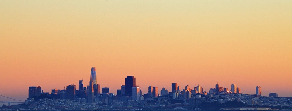 The San Francisco skyline at dusk.
