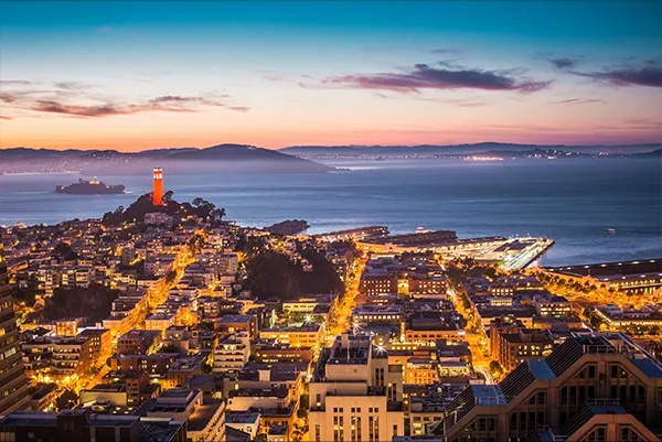 The skyline of San Francisco at dusk.